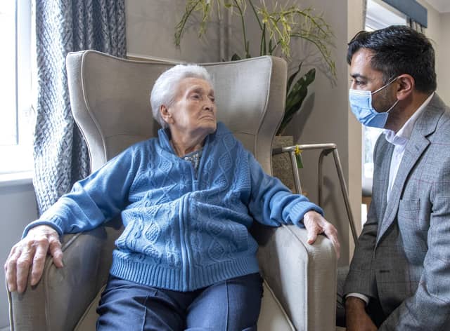 Health Secretary Humza Yousaf meets Agnes Taylor, 93, at Victoria Manor care home in Edinburgh last month when the winter Covid vaccine programme was launched (Picture: Lesley Martin/pool/Getty images)