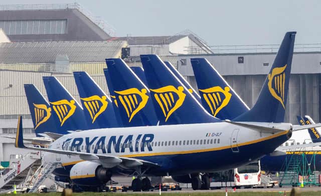 (FILES) In this file photo taken on March 23, 2020 Ryanair passenger jets are seen on the tarmac at Dublin airport. - Ryanair will restore 40 percent of flights from July 1, the Irish low-cost carrier announced on May 12, 2020, after running a skeleton service since mid-March as the coronavirus pandemic grounded planes worldwide. "Ryanair will operate a daily flight schedule of almost 1,000 flights, restoring 90 percent of its pre-COVID-19 route network," the Dublin-based carrier said in a statement. (Photo by Paul Faith / AFP) (Photo by PAUL FAITH/AFP via Getty Images)