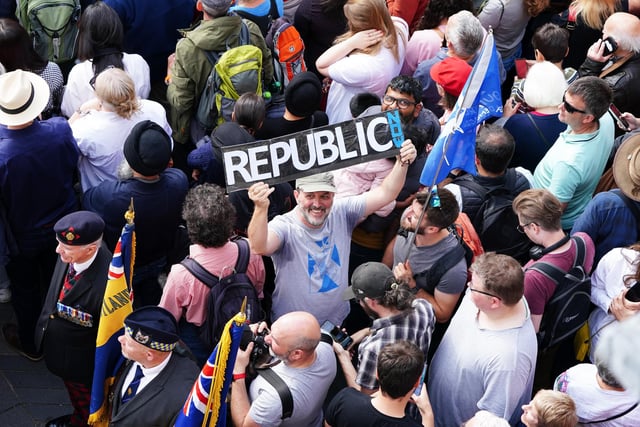 A member of the public protesting the Proclamation of Charles III.