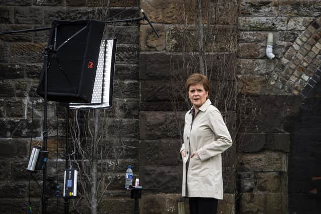 Scotland's First Minister and SNP leader Nicola Sturgeon waits for the camera technician as she launches the SNP's virtual election campaign. Picture: Andy Buchanan - Pool/Getty Images