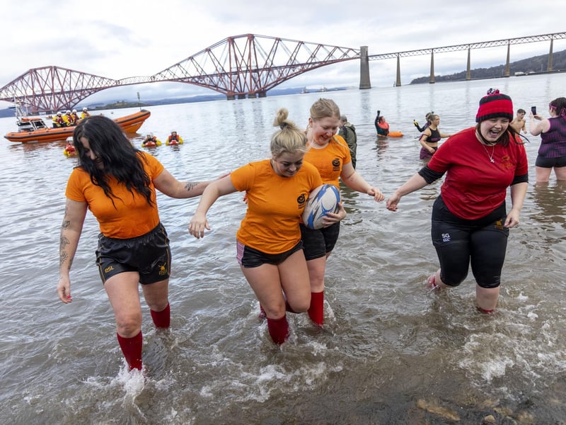 Rugby players take a dip in the waters