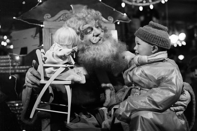 A little boy looked overjoyed as he spoke to Santa in Edinburgh department store Jenners in 1954.