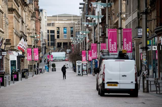 An almost empty Buchanan Street in the centre of Glasgow as people observe the spring 2020 lockdown. Non-essential stores have been forced to close for months now under tighter restrictions, hammering trade. Picture: John Devlin