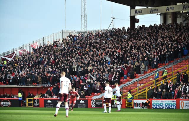 Hearts sold out the the visiting allocation of tickets at Pittodrie, with around 1,700 making the journey. Picture: Paul Byars / SNS