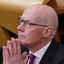Newly elected leader of the Scottish National Party (SNP) John Swinney, sits in the chamber at the Scottish Parliament on Tuesday May 7
