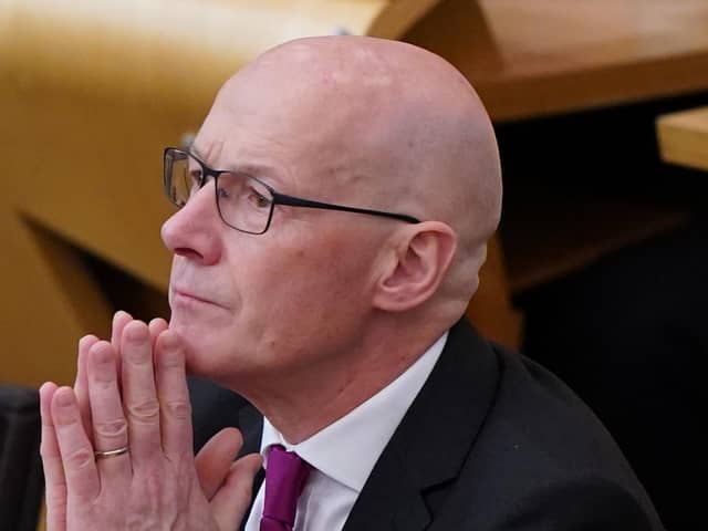 Newly elected leader of the Scottish National Party (SNP) John Swinney, sits in the chamber at the Scottish Parliament on Tuesday May 7