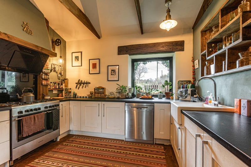 This rather rustic kitchen is the perfect surroundings for cooking up a storm for the family.