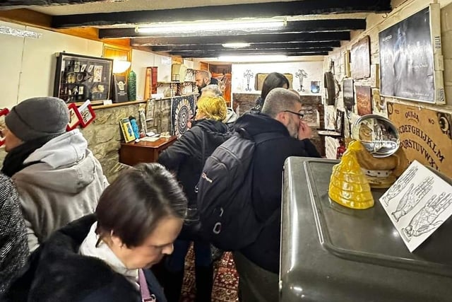 Visitors have a look around the museum at all the displays and artefacts, at the museum's opening night.