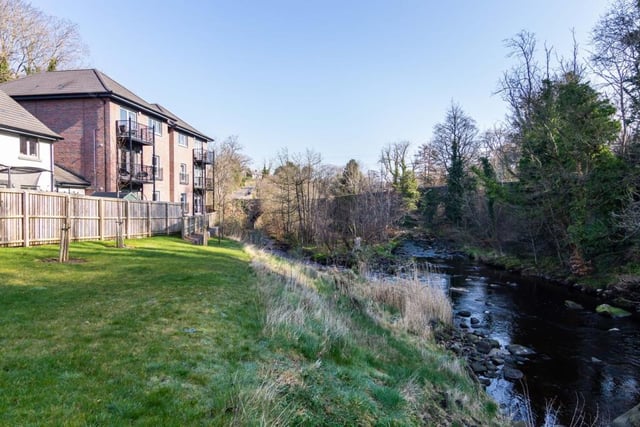 The property sits on the banks of the Water of Leith.