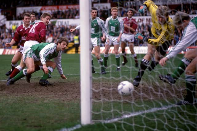 John Robertson scores for Hearts against Hibs in  3-1 win in 1991