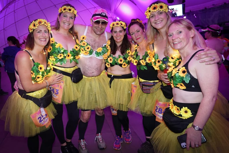 This group's sunflower-themed outfits and big smiles show how much they enjoyed this year's MoonWalk.