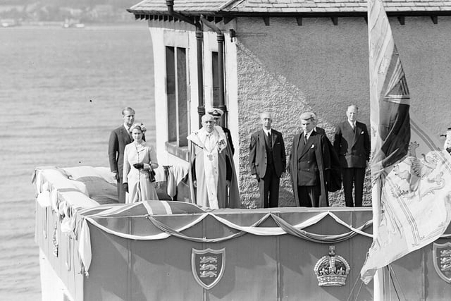 Queen Elizabeth II and the Duke of Edinburgh on the balcony at South Queensferry  in 1955.