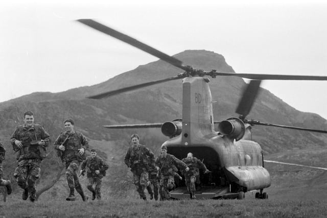 Members of the King's Own Scottish Borderers leave their helicopter before their their drum head/colours ceremony in Holyrood Park Edinburgh, March 1989. Picture was taken to mark the tricentenary of the regiment, founded in 1689 to protect Edinburgh from the Jacobites.