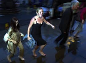 Kate Winslet makes her way through the rain to attend the after-party at the National Museum of Scotland following the premiere of Enigma in Edinburgh in 2001   Pic: Paul Chappells