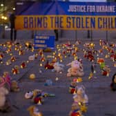 Teddy bears and toys represent the thousands of children abducted by Russian forces in Ukraine at this protest in Brussels last month (Picture: Nicolas Maeterlinck/Belga Mag/AFP via Getty Images)