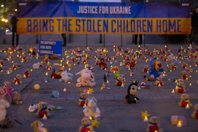 Teddy bears and toys represent the thousands of children abducted by Russian forces in Ukraine at this protest in Brussels last month (Picture: Nicolas Maeterlinck/Belga Mag/AFP via Getty Images)