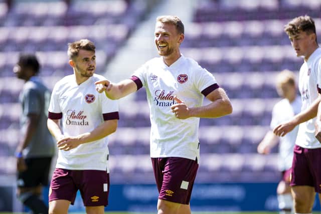 Stephen Kingsley is all smiles after scoring his second goal of the game for Hearts. Picture: SNS