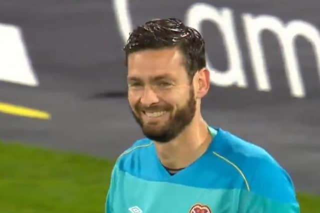 Hearts goalkeeper Craig Gordon laughing after a save against Hibs at Hampden in 2020.