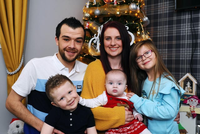 Home for Christmas seven-month-old Lily Graham was born with a large tumour and underwent two life saving operations in the first six weeks of her life.