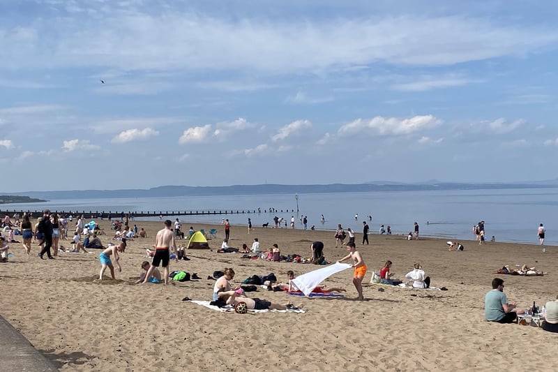 Edinburgh locals flocked to Portobello Beach on Friday to enjoy the hottest day of the year so far.