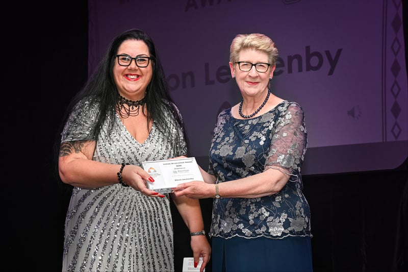 Alison Leckenby receives the lifetime achievement award, presented by Beverley Alderton-Sambrook, head of regeneration service from award sponsors Bassetlaw District Council.