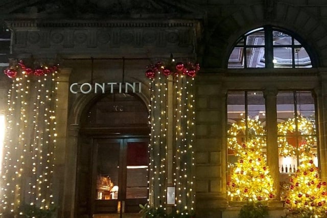 This Italian restaurant on George Street lights your path with a trail of golden Christmas trees at the door and twinkling lights.