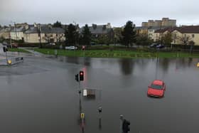 Cars were stranded at the flooded junction at Crewe Toll on Friday