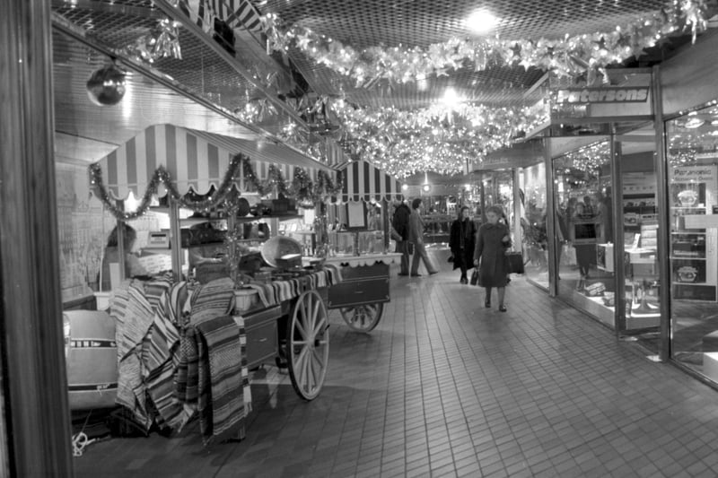 Edinburgh shopping centre Waverley Market decorated with Christmas lights for shoppers in December 1985.