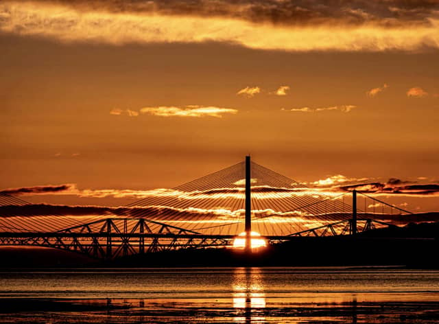 52 year-old Martin Brown captured the sun rising over the Queensferry Crossing, the Forth Road Bridge and the ‘iconic’ Forth Rail Bridge this morning (Photo: Martin Brown).