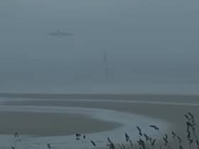 A coastguard helicopter was spotted circling above Cramond Island on Sunday evening after a member of the public raised concern for two people in a kayak at sea in the bad weather.