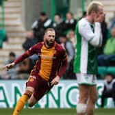 Kevin van Veen wheels away after scoring his second and Motherwell's third