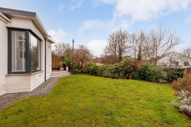 To the rear of the property is this enclosed south-east garden with patio, lawn and mature borders. To the front of the property is a driveway giving parking for two vehicles and a front garden with flag-stone path leading to the front door.