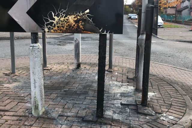 A roundabout on Hay Avenue has been left scorched after gangs of youths set off fireworks and petrol bombs