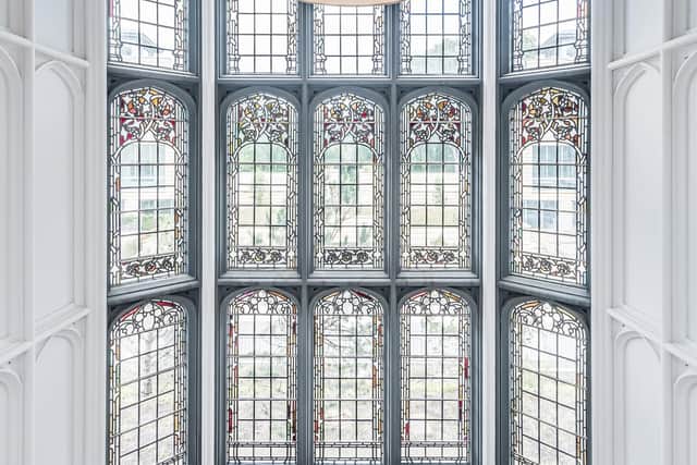The spectacular full length stained glass bay window. Pic: Chris Humphreys Photography.