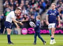 Scotland’s Stuart Hogg (right) watches as his son Archie delivers the match ball to referee Luke Pearce ahead of the Guinness Six Nations match at BT Murrayfield Stadium, Edinburgh.
