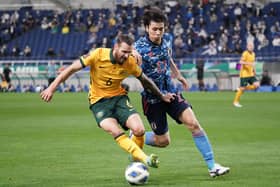 Martin Boyle in action for Australia as Japan's Ao Tanaka keeps tabs on the Hibs winger during the FIFA World Cup Asian qualifier final round Group B match at Saitama Stadium