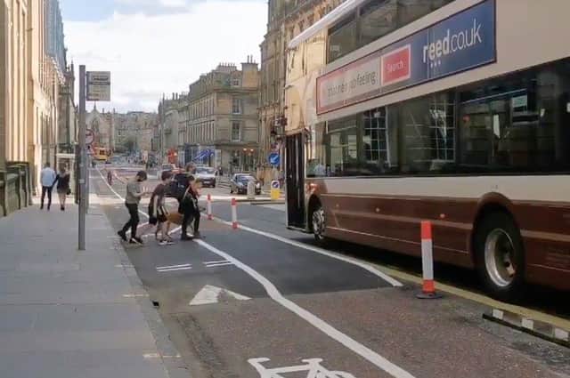 Floating bus stops required pedestrians to cross a cycle lane when getting on or off a bus.