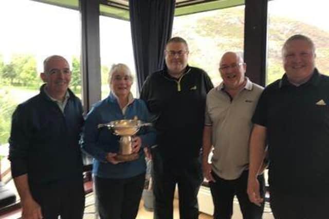 The winning Smarts TSB team of Alan Dickson, Shaun Kelley, Richard Wight and Alistair Goodwin pictured with Prestonfield Golf Club vice captain Lyn Abernethy. Picture: Lothians Golf Association.