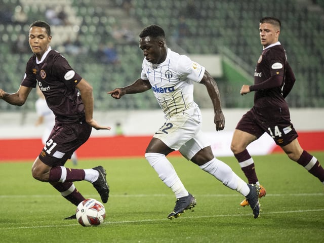 Toby Sibbick and Cammy Devlin try to chase down Zurich's Wilfried Gnonto