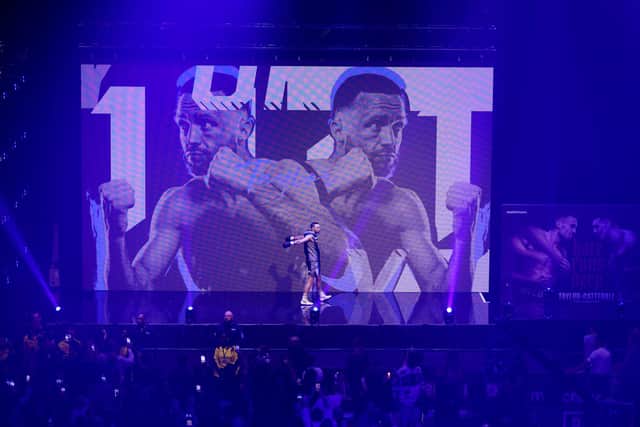Josh Taylor makes his entrance into Leeds' First Direct Arena.