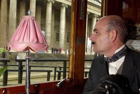 Hercule Poirot admires the scenery on board a 1920s Venice Orient-Express carriage (Picture: Michael Stephens/PA)