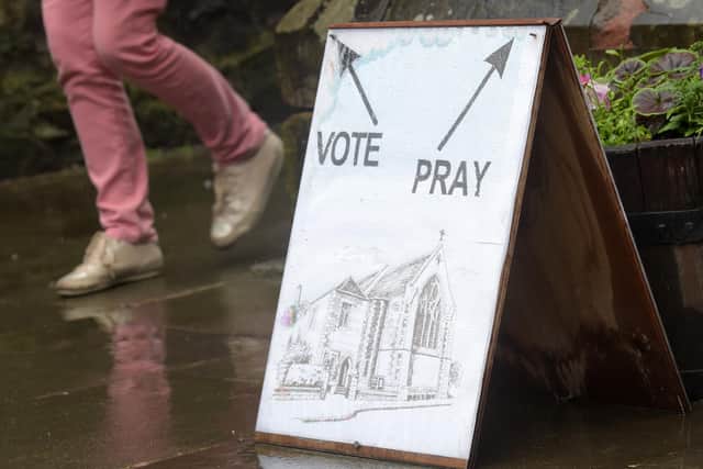 A sign outside a polling station at St James Church in Edinburgh, during the 2017 UK general election (Picture: Lesley Martin/AFP via Getty Images)