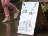 A sign outside a polling station at St James Church in Edinburgh, during the 2017 UK general election (Picture: Lesley Martin/AFP via Getty Images)