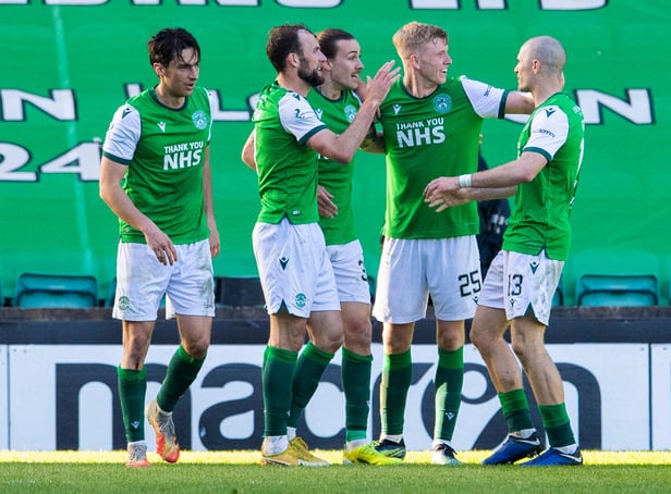 Team-mates celebrate with Hibs scorer Jackson Irvine after the Aussie put his side two ahead. Picture: SNS