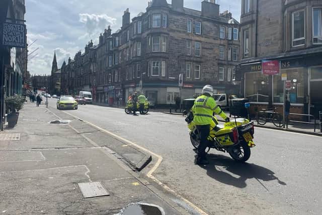Two men were taken to hospital, after a car and a pedestrian collided on Easter Road in the Leith area of Edinburgh.