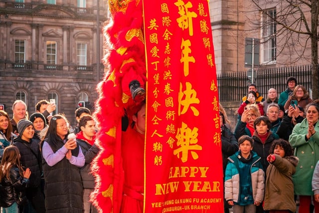 Crowds celebrated at St James Quarter by trying their hand at the intricate art of Chinese calligraphy and by making traditional red banners to mark the Lunar New Year.
