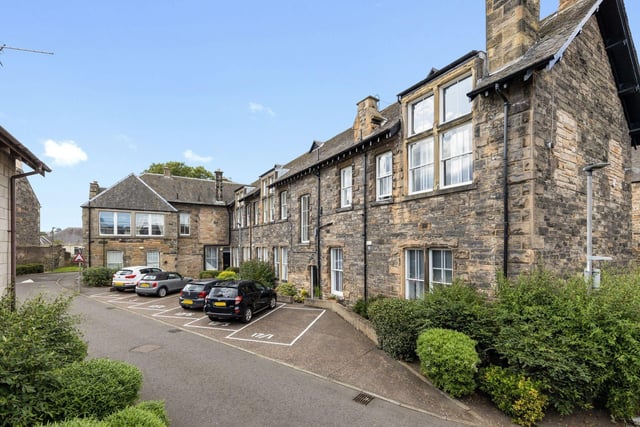 The apartment is set within a Victorian schoolhouse conversion in the ever-popular Leith Links district of Edinburgh.