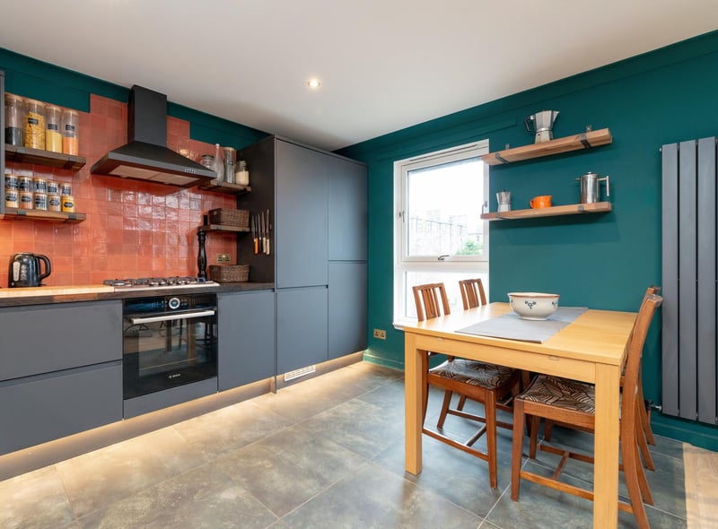 The kitchen is now a stylish open plan space with ample room for a large dining table with a built-in 5 burner gas hob, Bosch oven, integrated fridge freezer and integrated dishwasher.