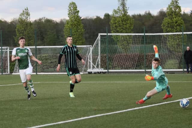 Ethan Laidlaw scores Hibs' consolation in their 3-1 defeat by Celtic. Picture: Maurice Dougan