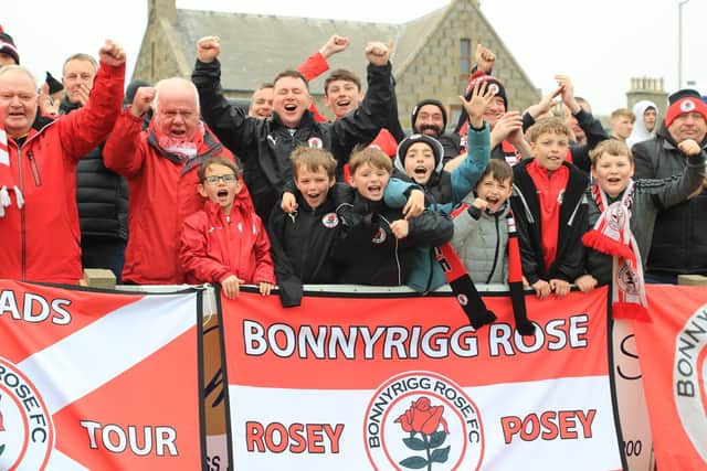 Bonnyrigg Rose fans celebrate at full-time after a 3-2 win on aggregate over Fraserburgh. Picture: Joe Gilhooley LRPS